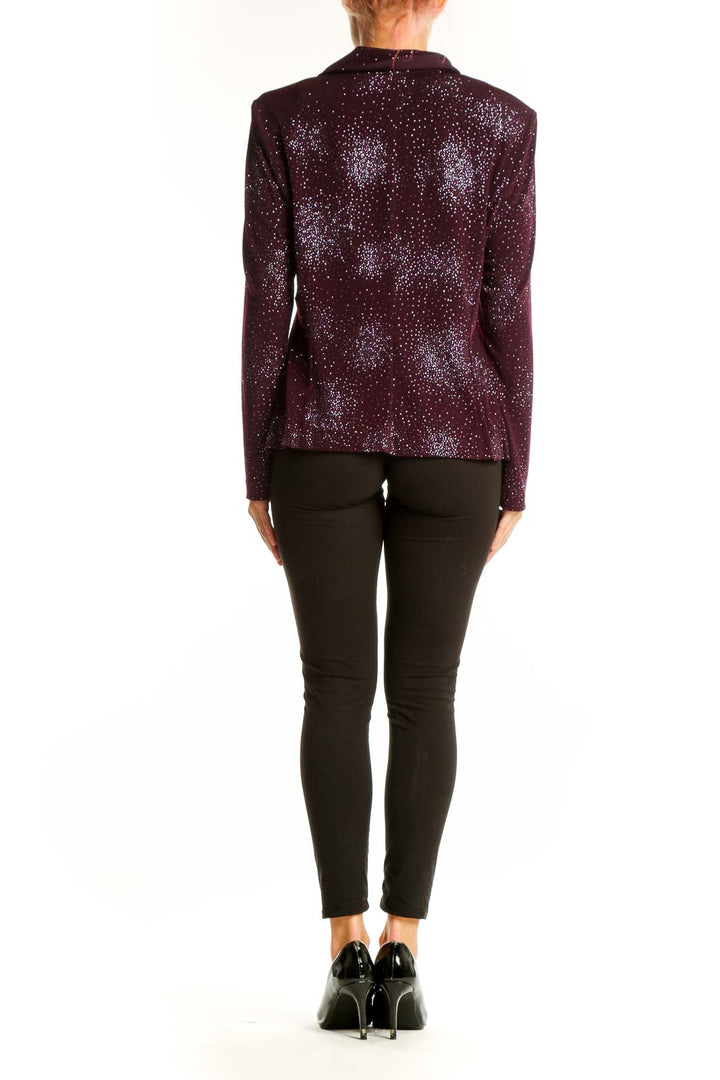 Side view of model wearing R&K Originals burgundy sparkle blouse with black pants