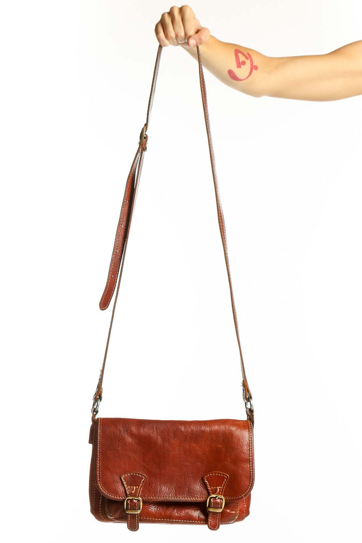 Front view of SilkRoll brown genuine leather messenger bag with buckle closures