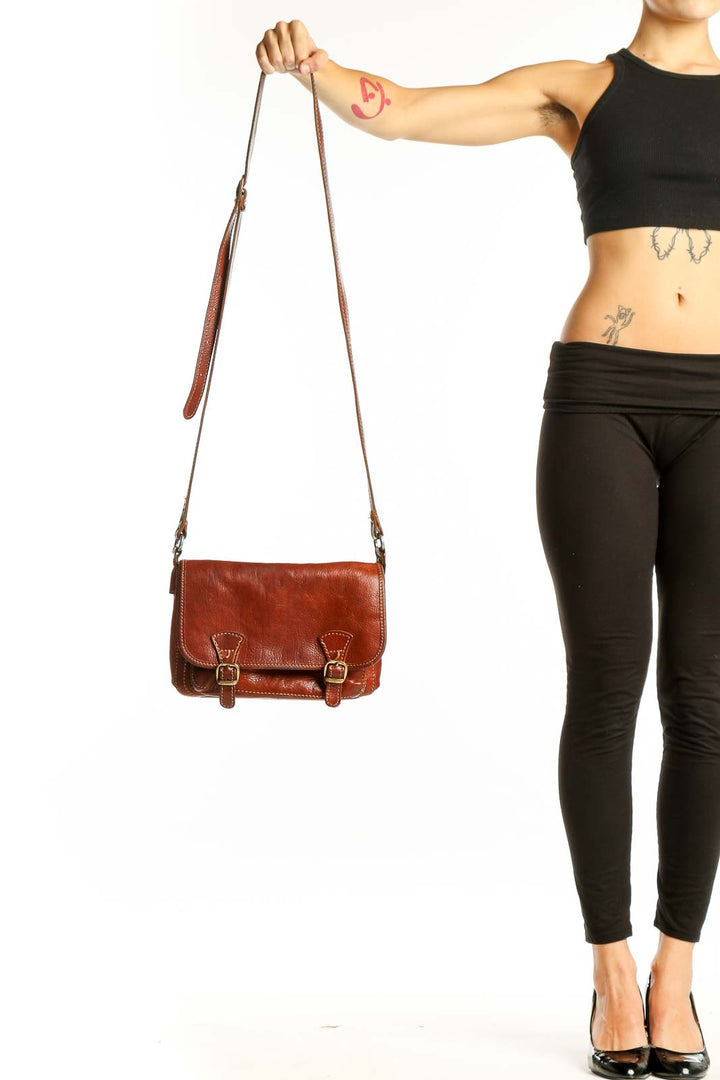 Front view of SilkRoll brown genuine leather messenger bag with buckle closures