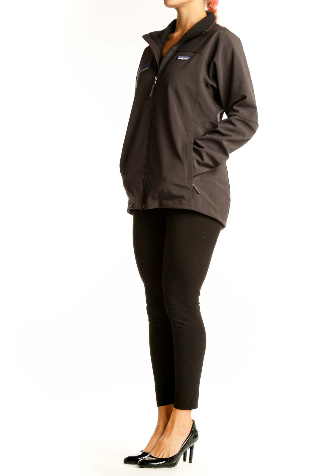 Front view of brown Patagonia softshell jacket with Wharton logo