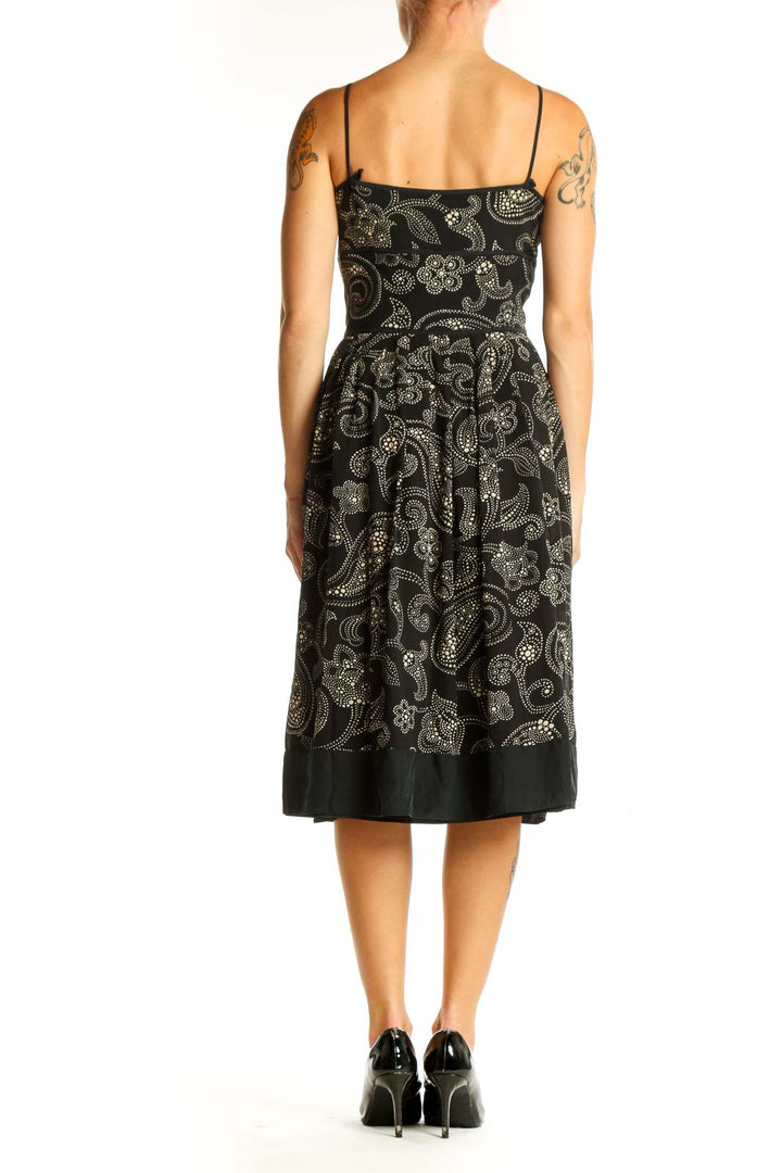 Side view of Ann Taylor black paisley print spaghetti strap dress