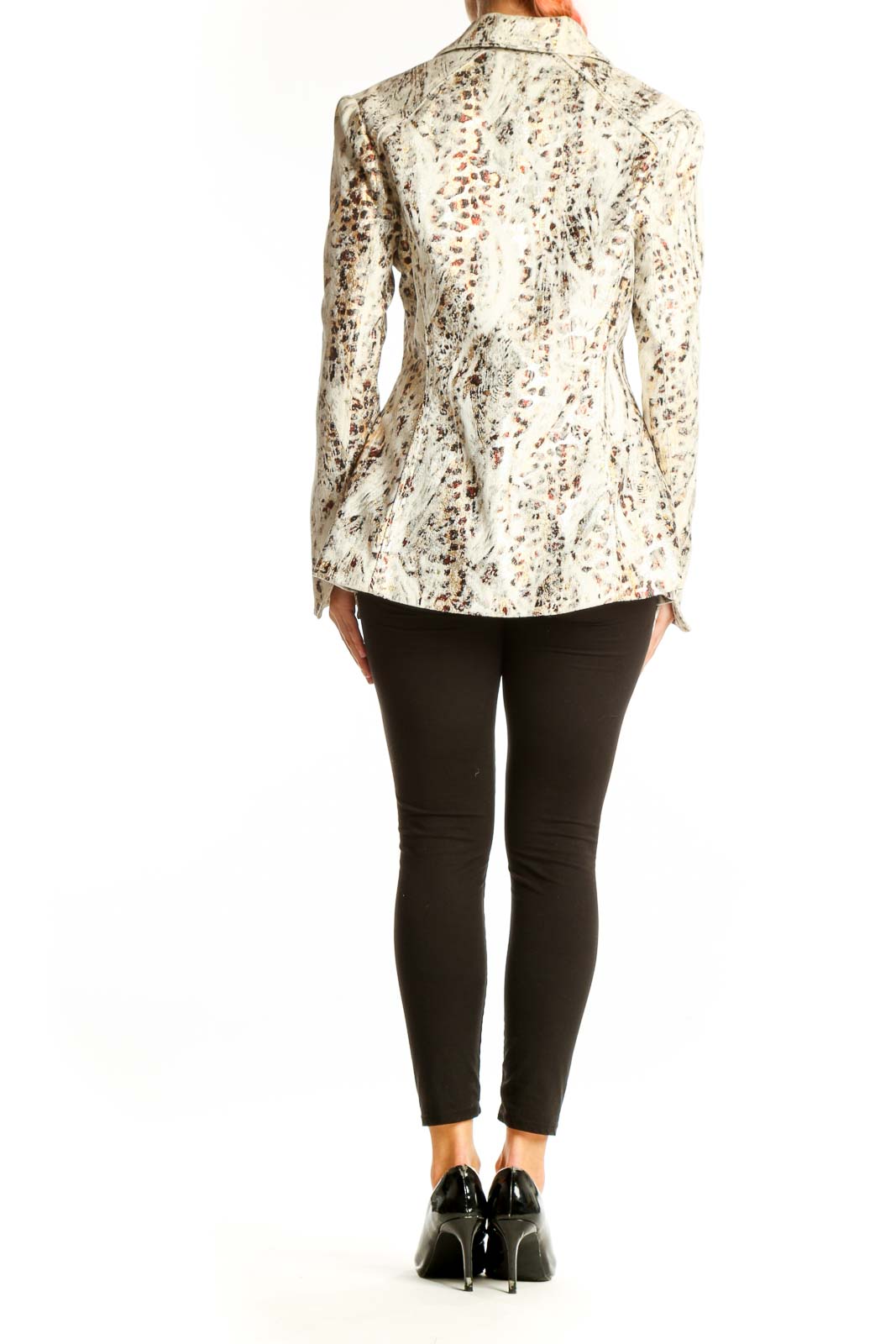Side view of cream animal print blazer by Berek with black pants