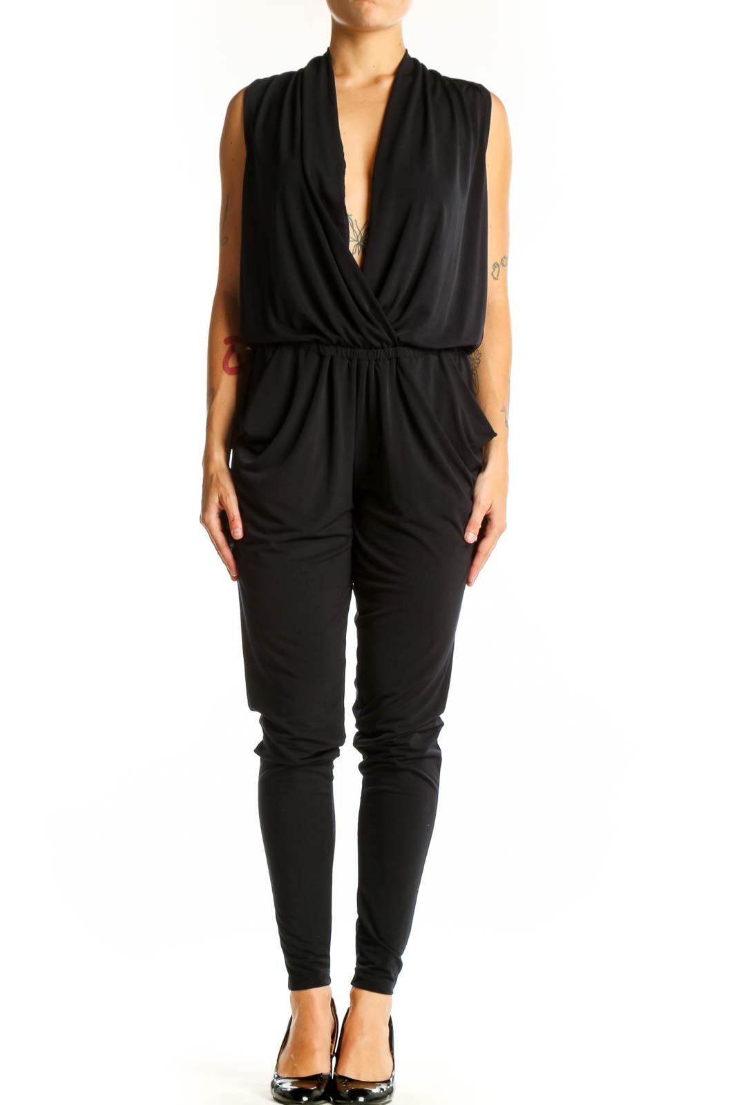 Front view of black MICHAEL Michael Kors wrap jumpsuit with plunging neckline