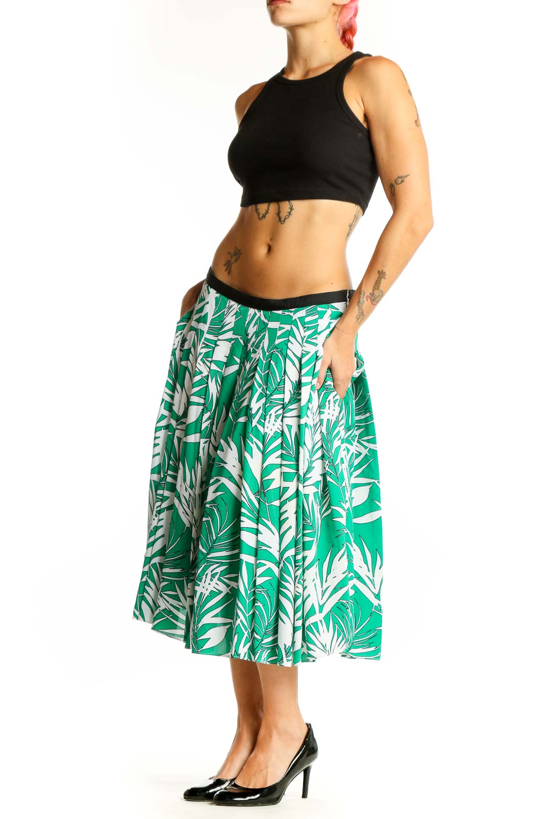 Front view of green tropical print pleated midi skirt from Talbots