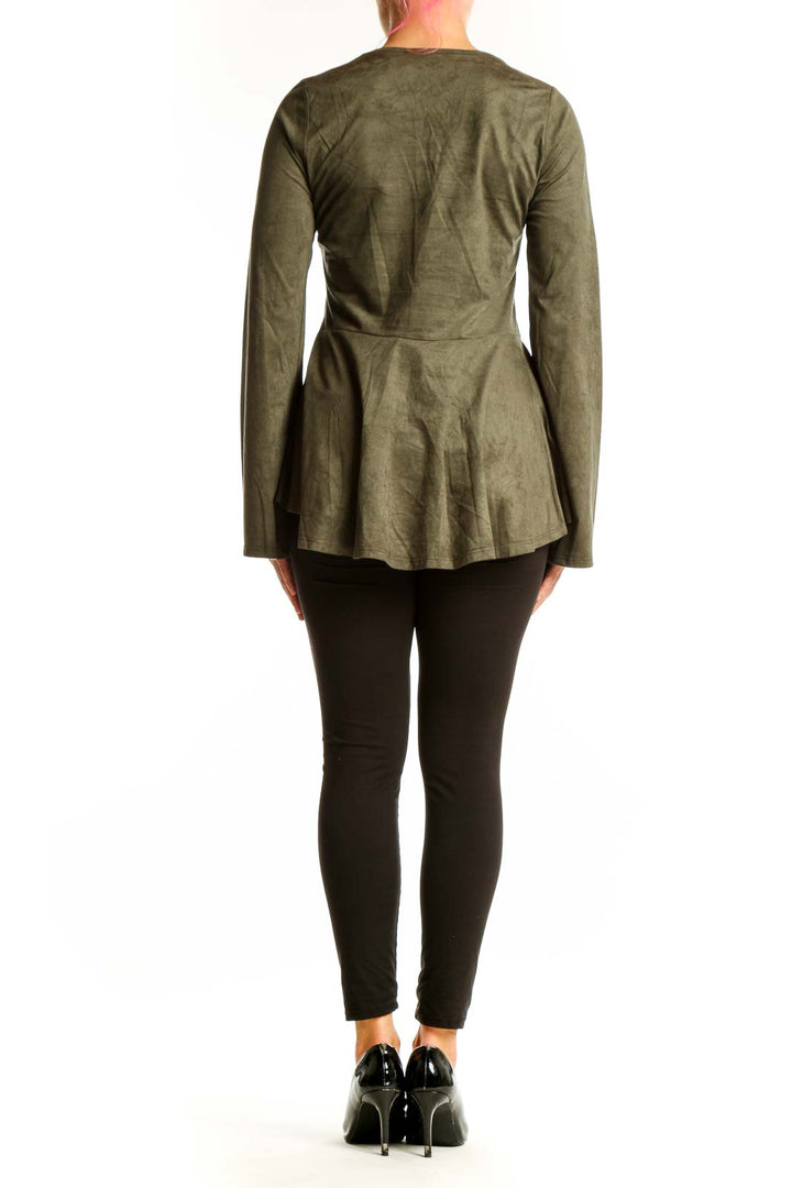 Side view of olive suede peplum top showing bell sleeves and peplum waist