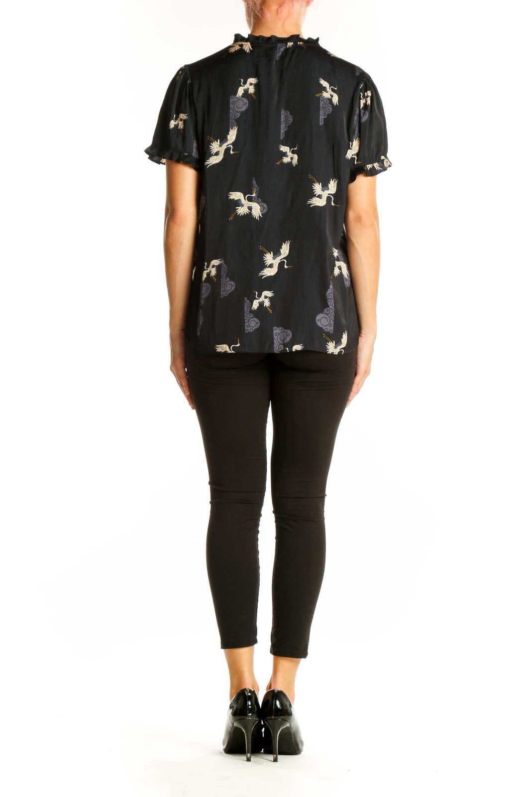 Back view of Tahari black polyester blouse showing all-over crane and cloud print
