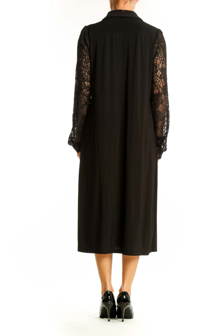 Side view of Tommy Hilfiger black midi dress showing lace sleeve detail