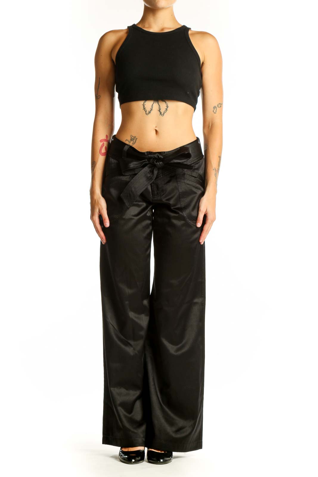 Front view of Armani Exchange black satin wide-leg dress pants with bow detail