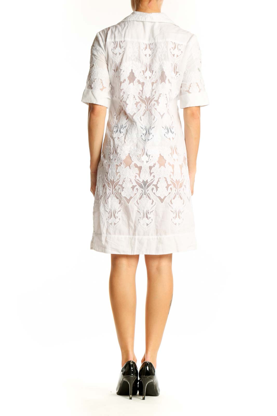 Side view of Elie Tahari white lace overlay shirt dress showing intricate lace pattern