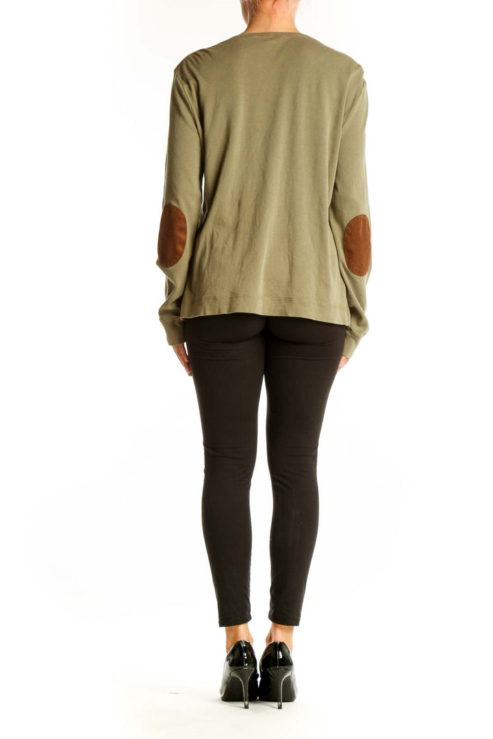 Side view of olive green Lauren Ralph Lauren top showing leather elbow patch