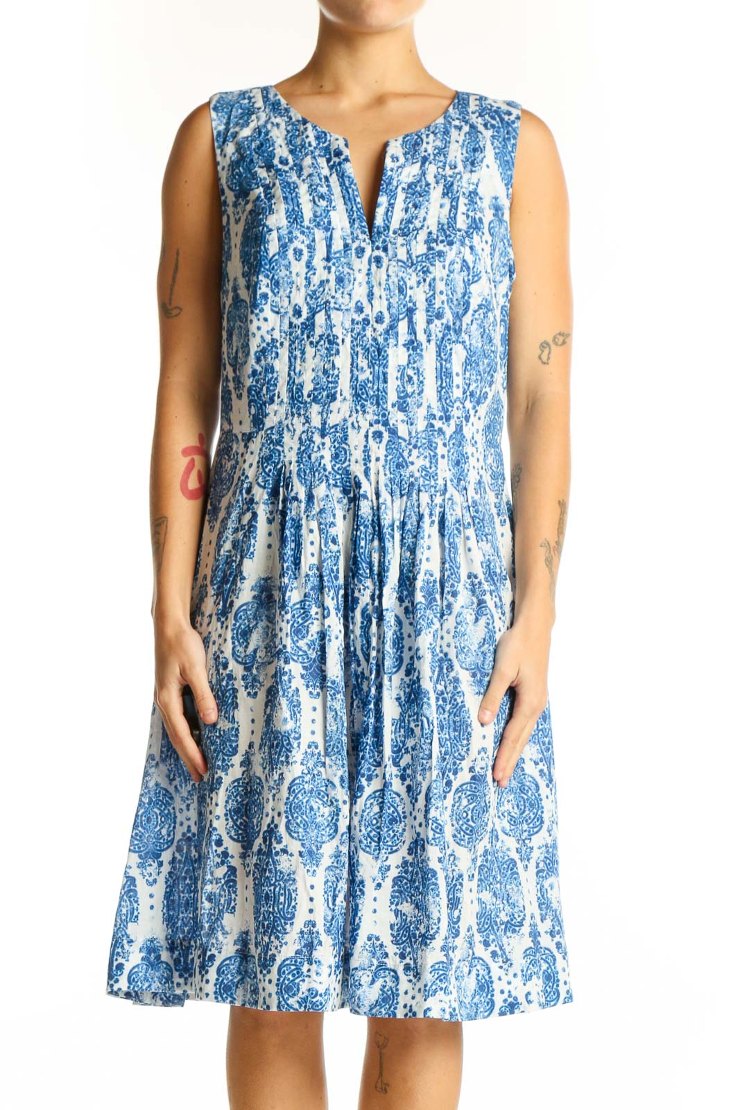 Front view of NYDJ blue and white floral print sleeveless dress with V-neck