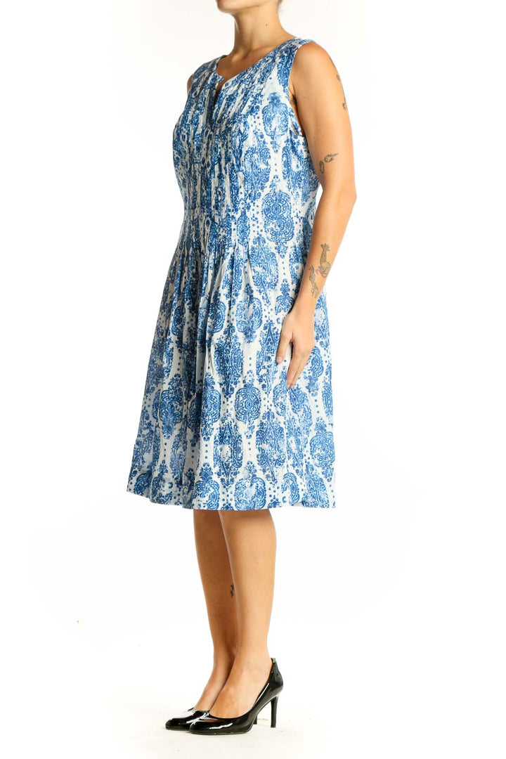 Front view of NYDJ blue and white floral print sleeveless dress with V-neck