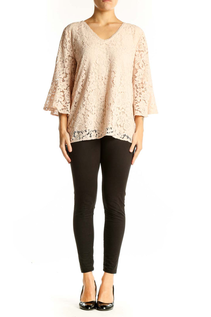 Front view of blush lace bell sleeve V-neck blouse from LOFT Outlet