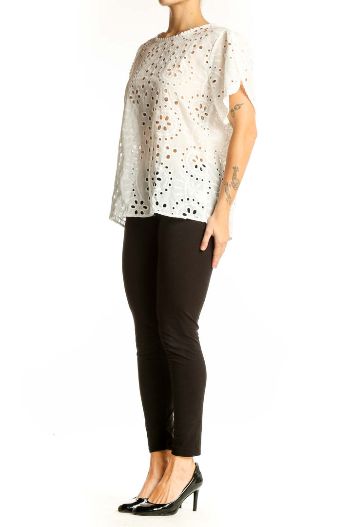Front view of white eyelet lace short sleeve top by SilkRoll