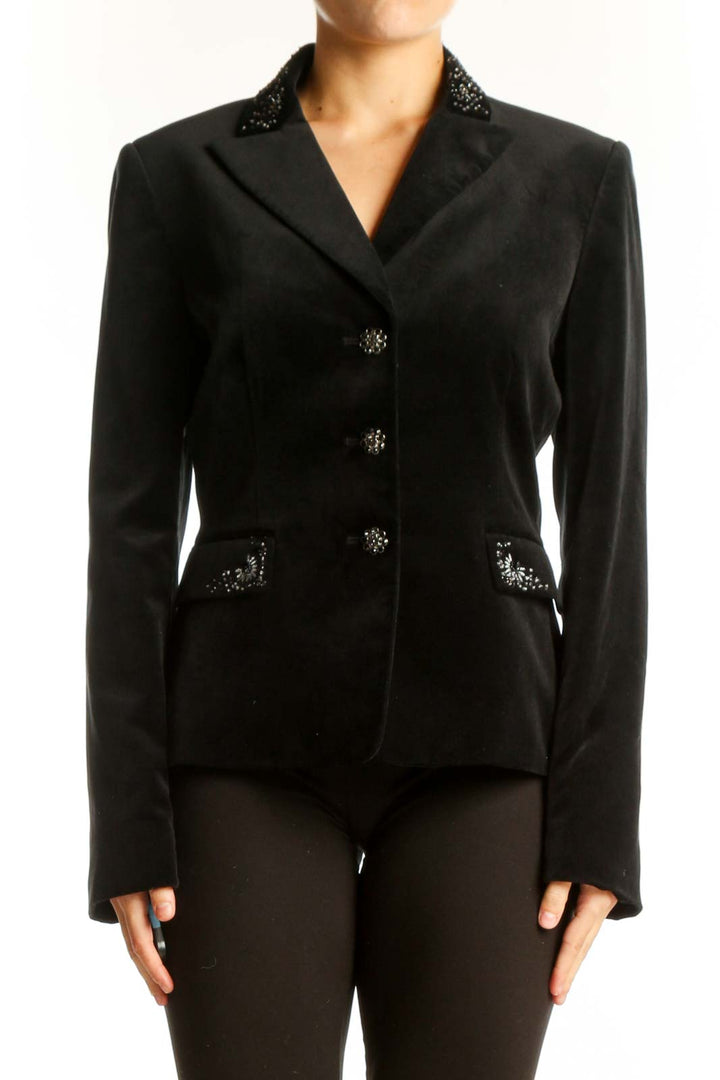 Front view of black Tahari blazer with embellished collar and pockets