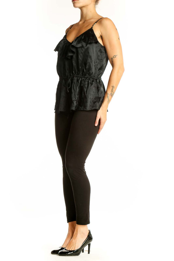 Front view of Trina Turk black silk camisole top with ruffled V-neckline