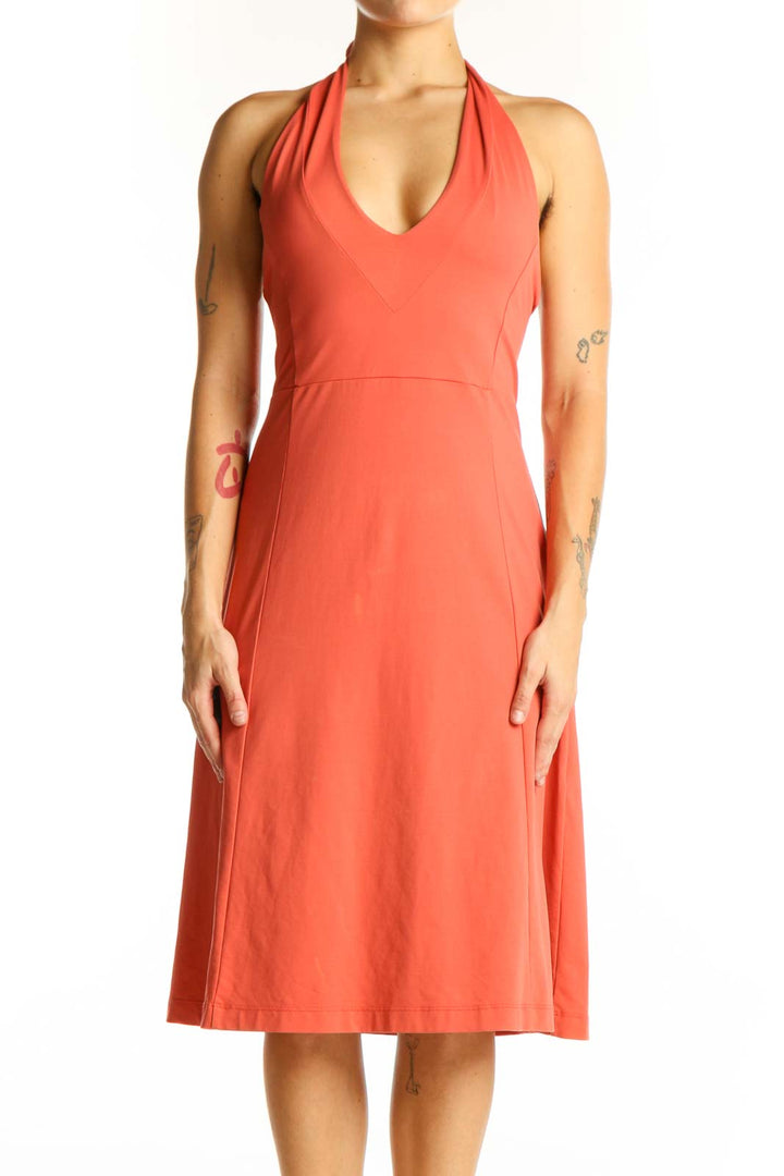 Front view of coral Patagonia halter neck A-line dress