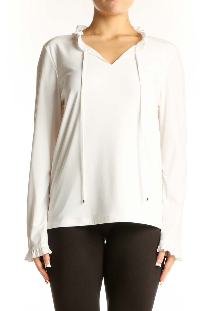 Front view of white Tommy Hilfiger V-neck top with ruffle details