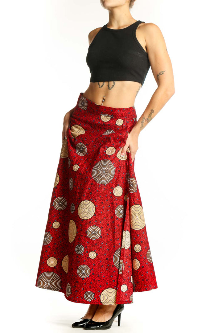 Front view of red maxi skirt with circular patterns