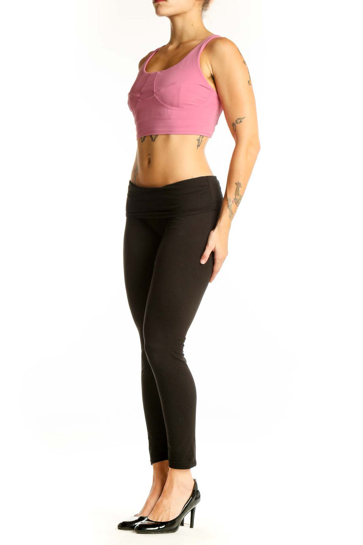 Front view of pink Lululemon racerback crop top