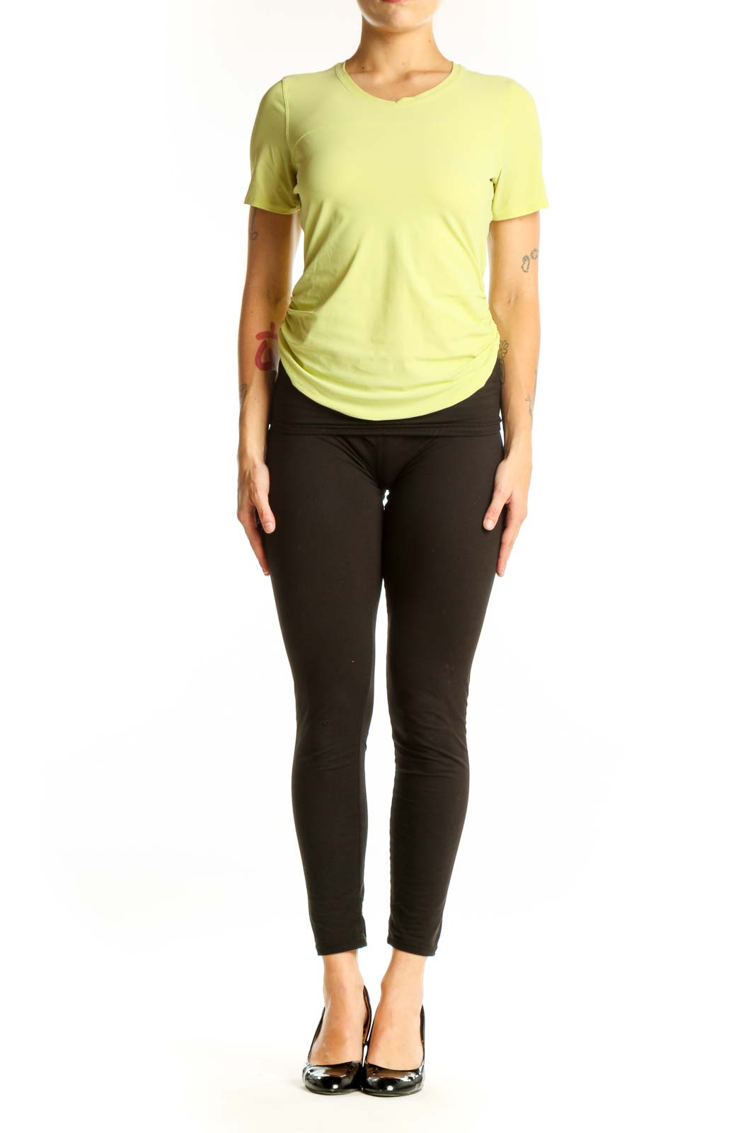 Front view of yellow Lululemon short-sleeve athletic top