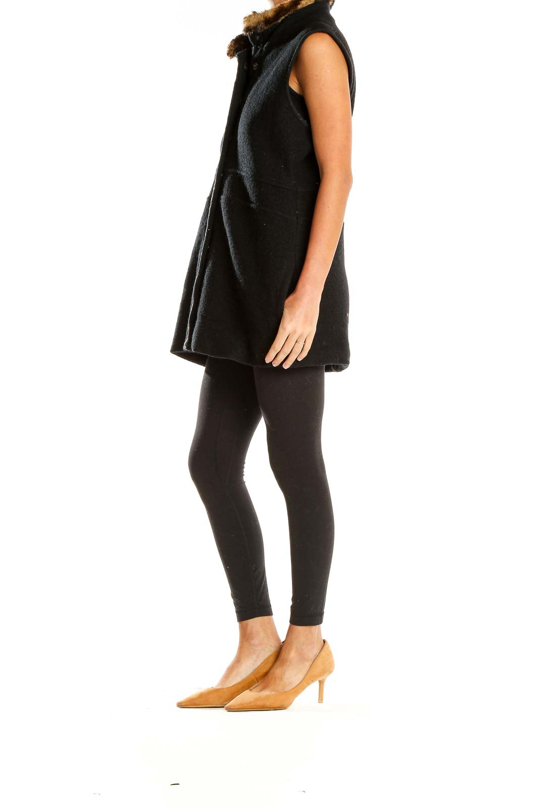 Front view of Icelandic Design black vest with golden embroidery and fur-trimmed collar