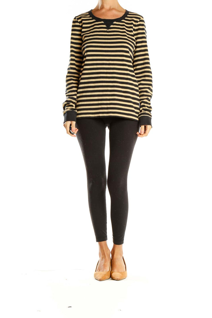 Front view of Patagonia black and tan striped long sleeve knit top