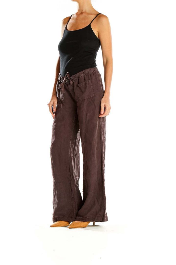 Front view of Joie brown wide-leg linen pants with drawstring waist