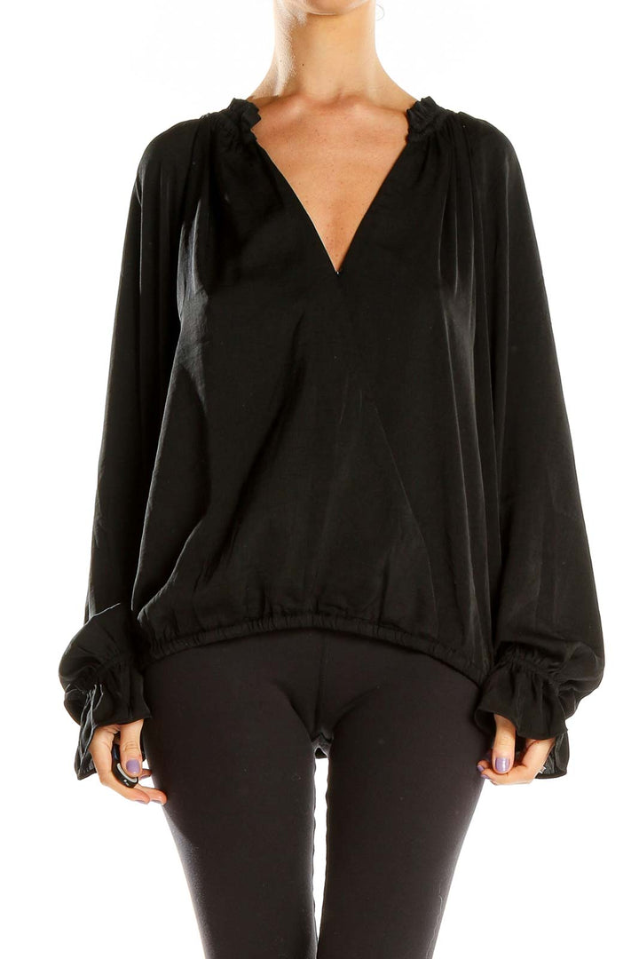 Front view of Banana Republic black V-neck flowy blouse with gathered neckline