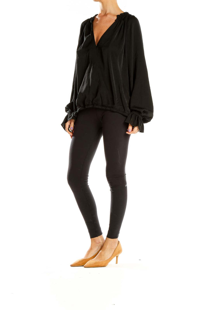 Front view of Banana Republic black V-neck flowy blouse with gathered neckline