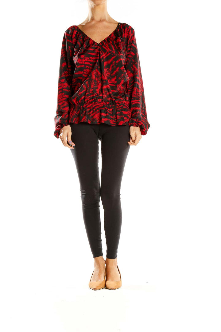 Front view of MICHAEL Michael Kors red abstract print V-neck blouse