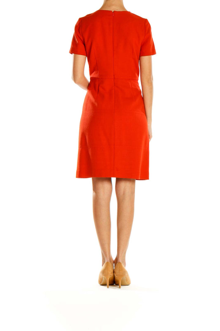 Side view of red short-sleeve A-line dress from Banana Republic