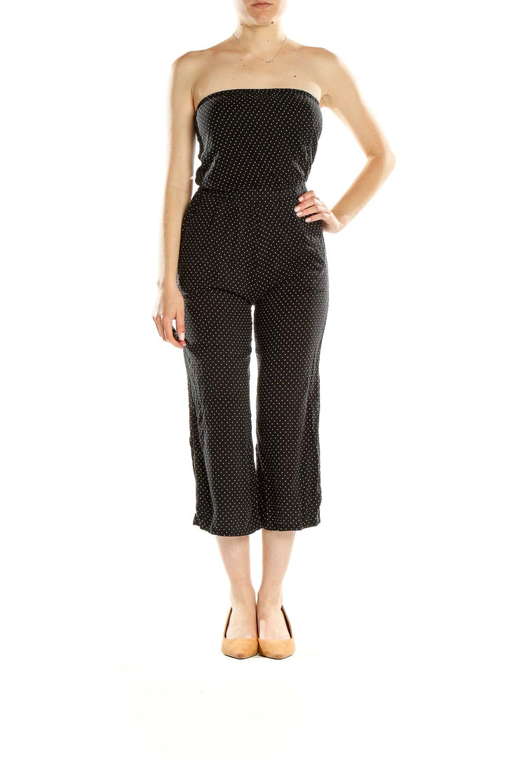 Front view of Full Tilt black polka dot strapless jumpsuit
