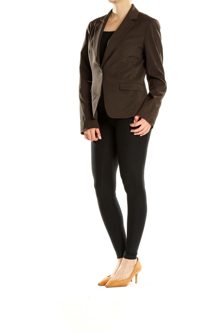 Front view of Tahari brown single-button blazer on model