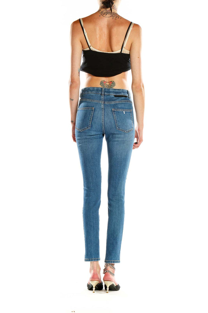 Back view of Stella McCartney blue slim-fit jeans on model
