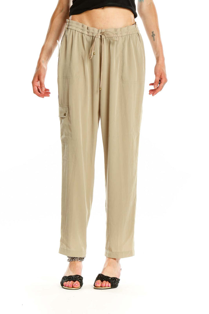 Front view of beige relaxed fit drawstring pants by Jones New York