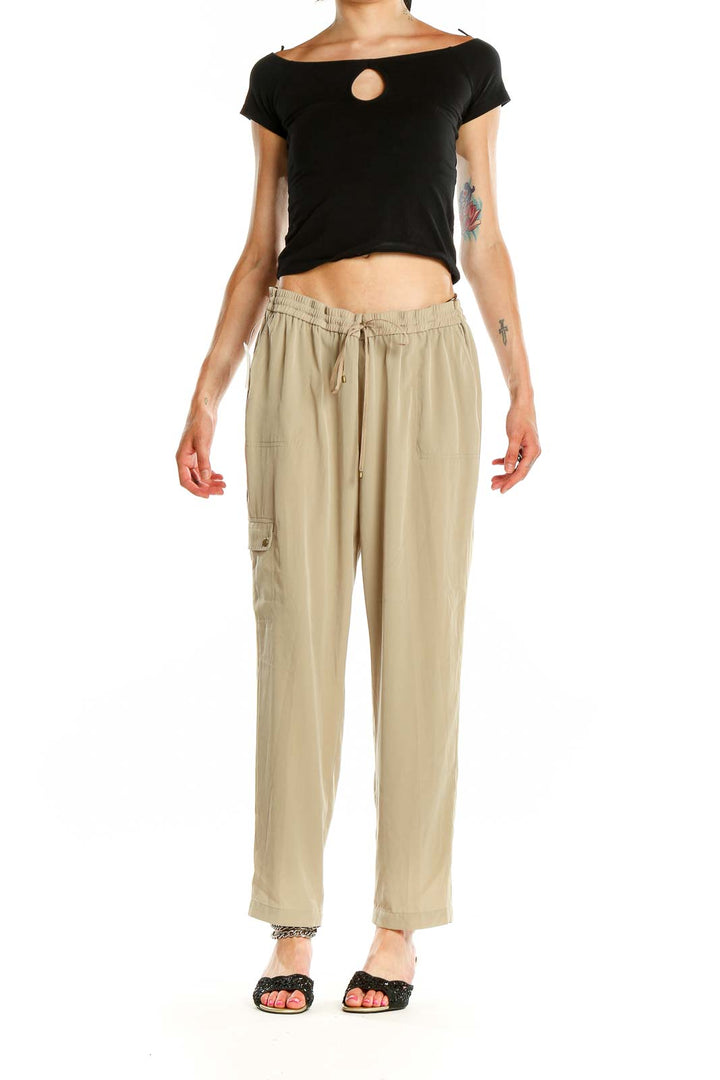 Front view of beige relaxed fit drawstring pants by Jones New York