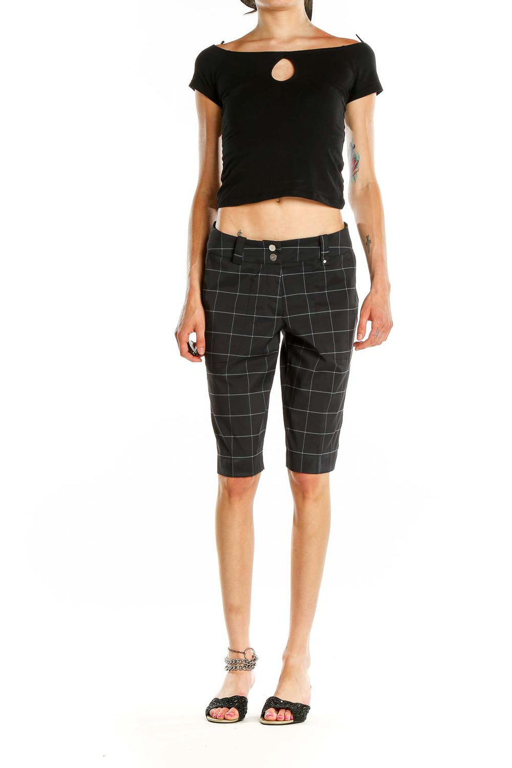 Front view of Nike Golf black plaid shorts with windowpane check pattern