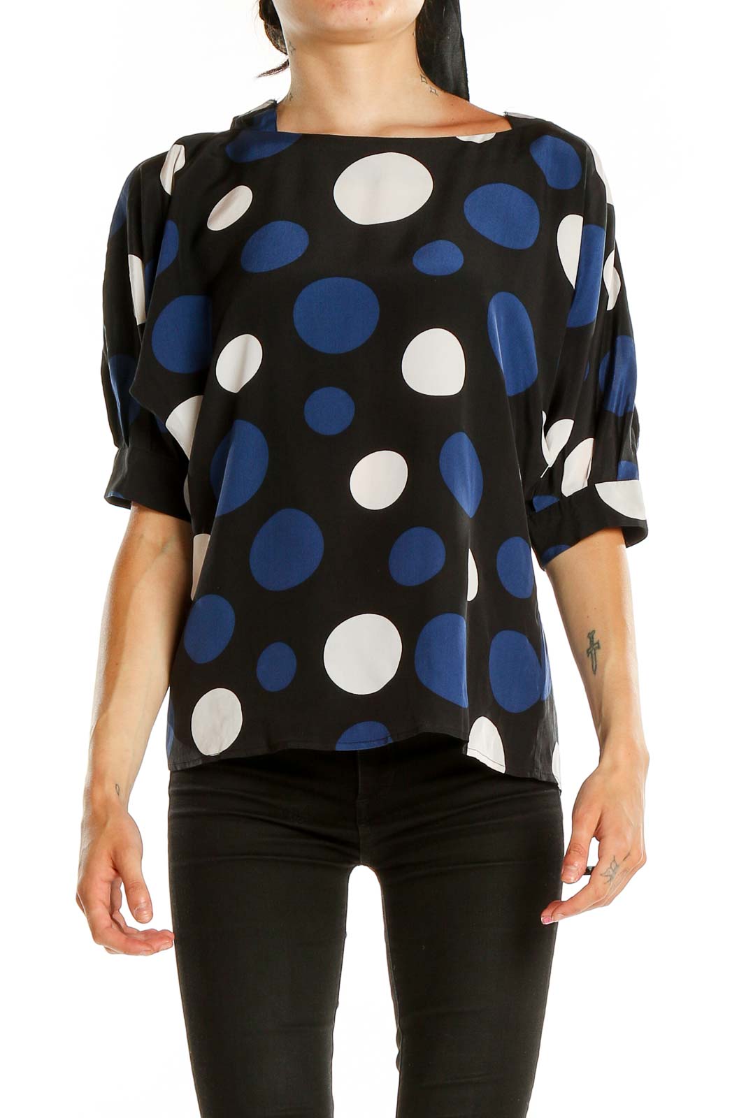 Front view of MICHAEL Michael Kors black blouse with blue and white polka dots