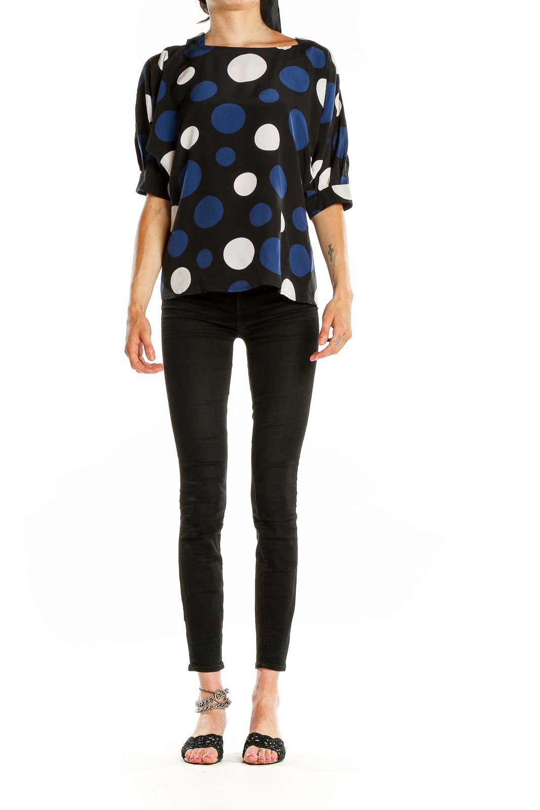 Front view of MICHAEL Michael Kors black blouse with blue and white polka dots