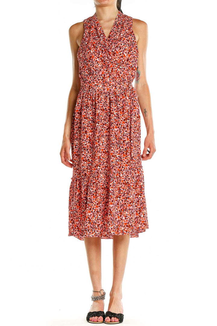 Front view of London Times red floral halter midi dress with tiered skirt