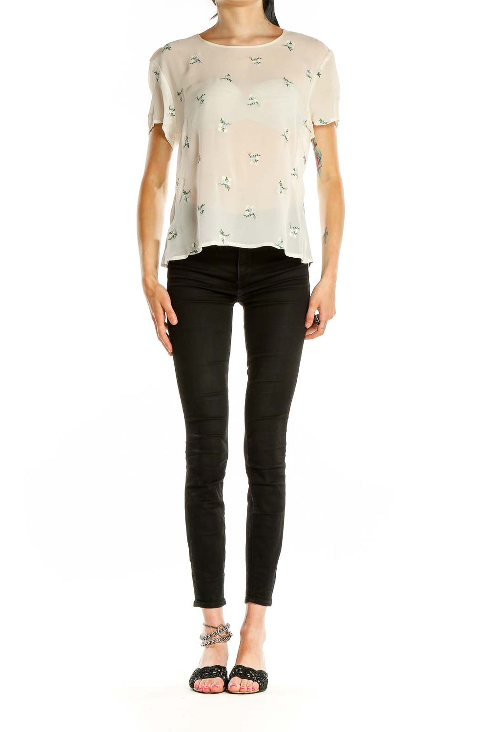 Front view of Laura Ashley cream blouse with green floral print and short sleeves