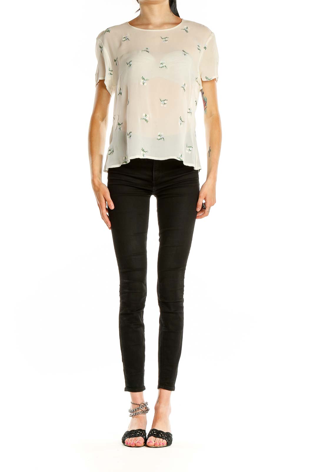 Front view of Laura Ashley cream blouse with green floral print and short sleeves