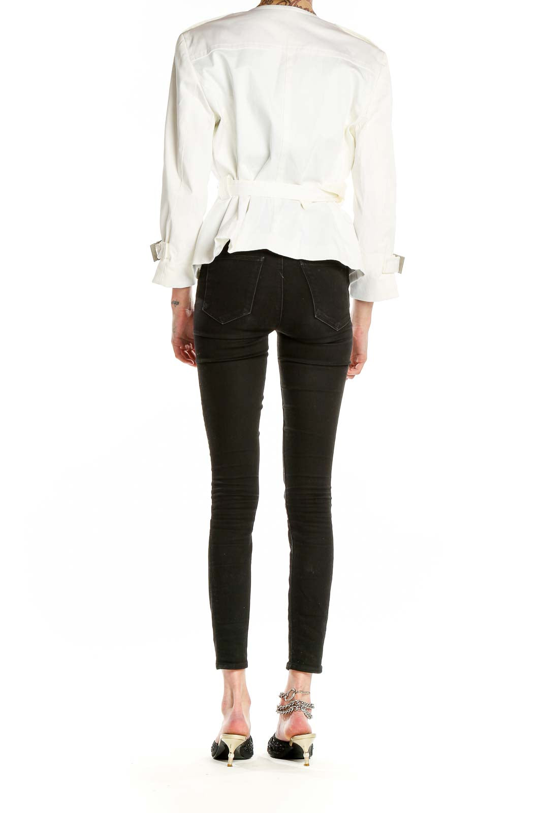 Back view of Calvin Klein white double-breasted jacket on model