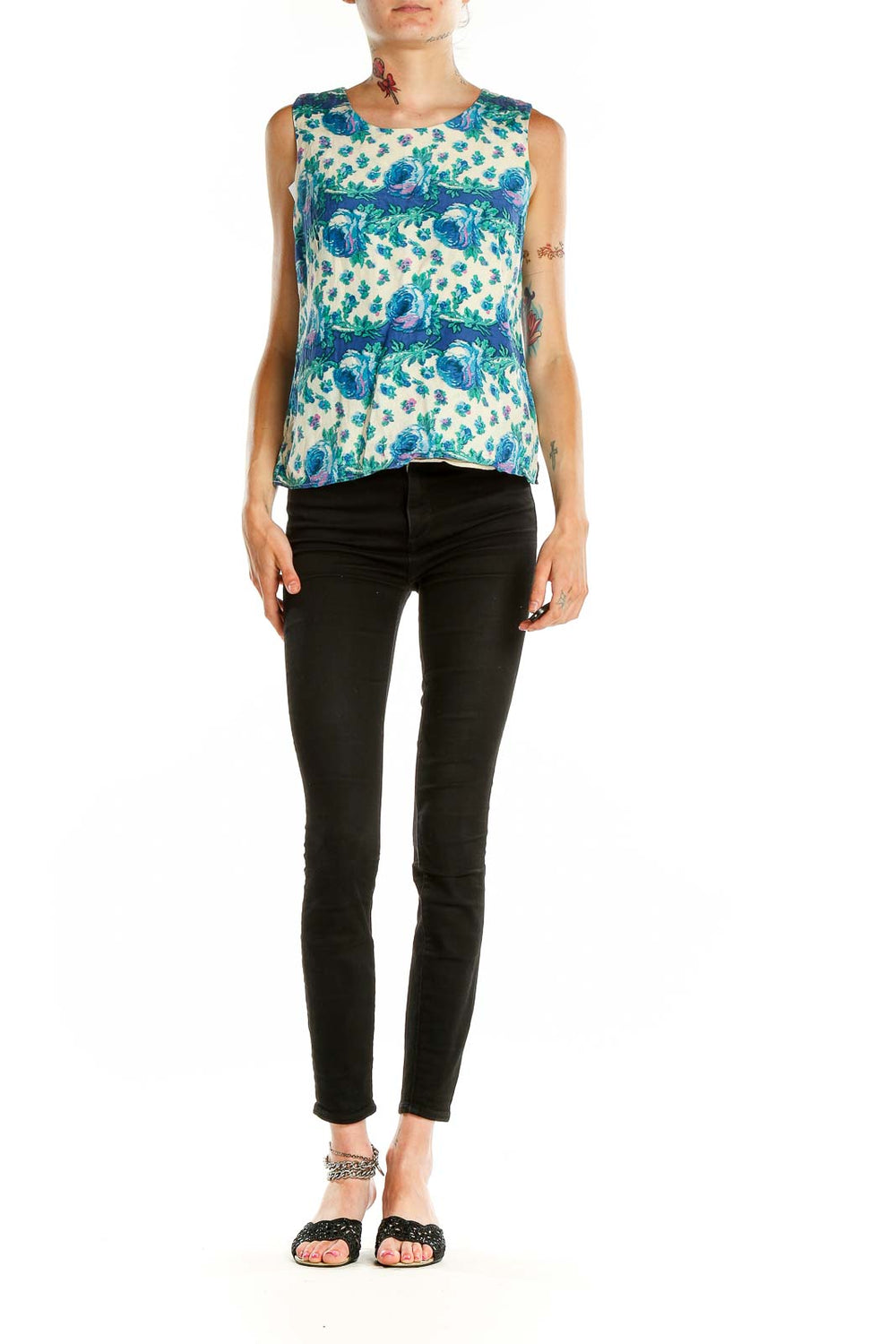 Front view of Talbots blue floral sleeveless blouse on white background