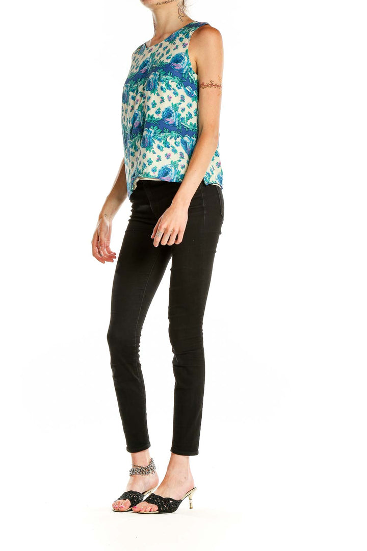 Front view of Talbots blue floral sleeveless blouse on white background