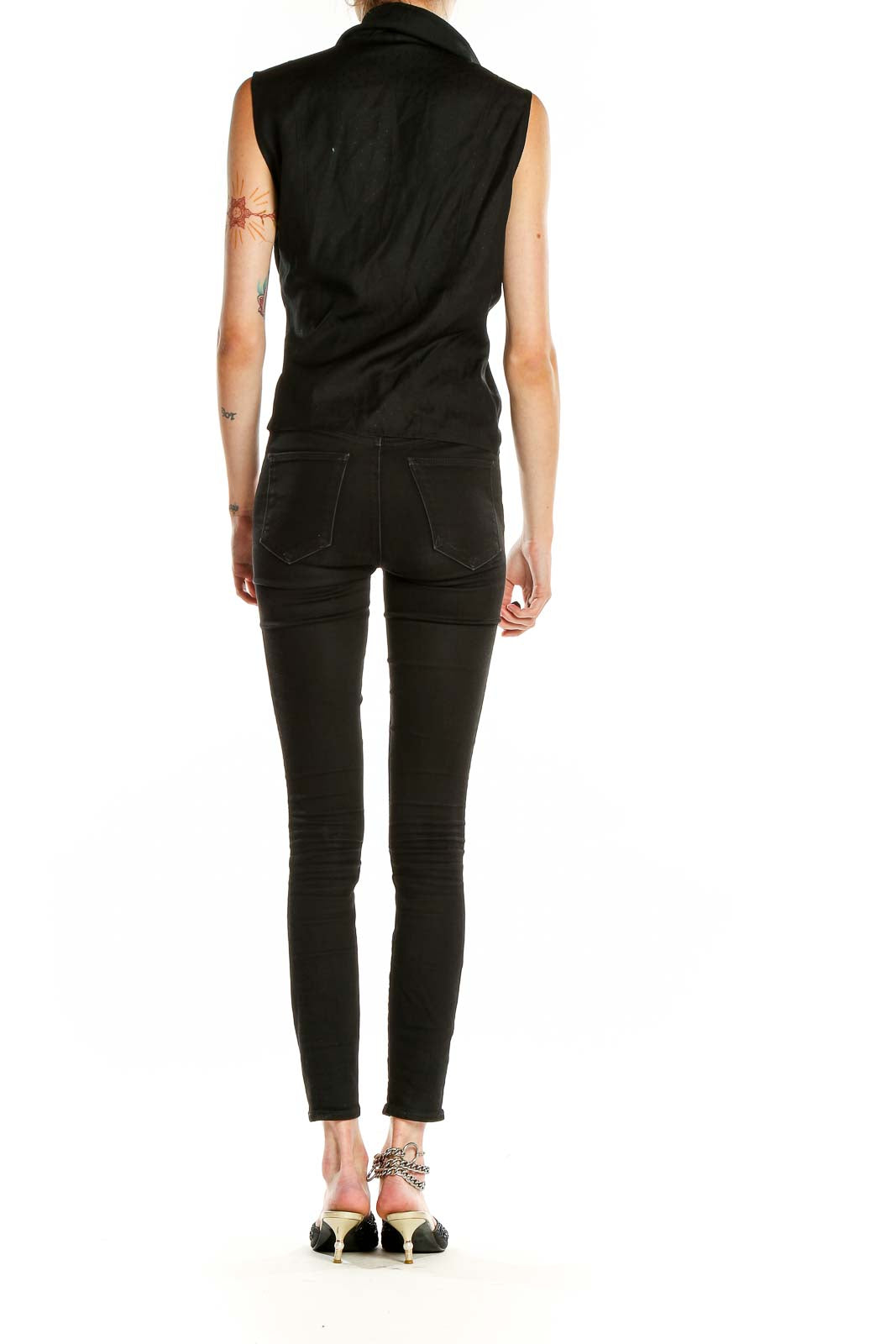 Side view of Kate Hill black sleeveless wrap top showing tie-waist detail