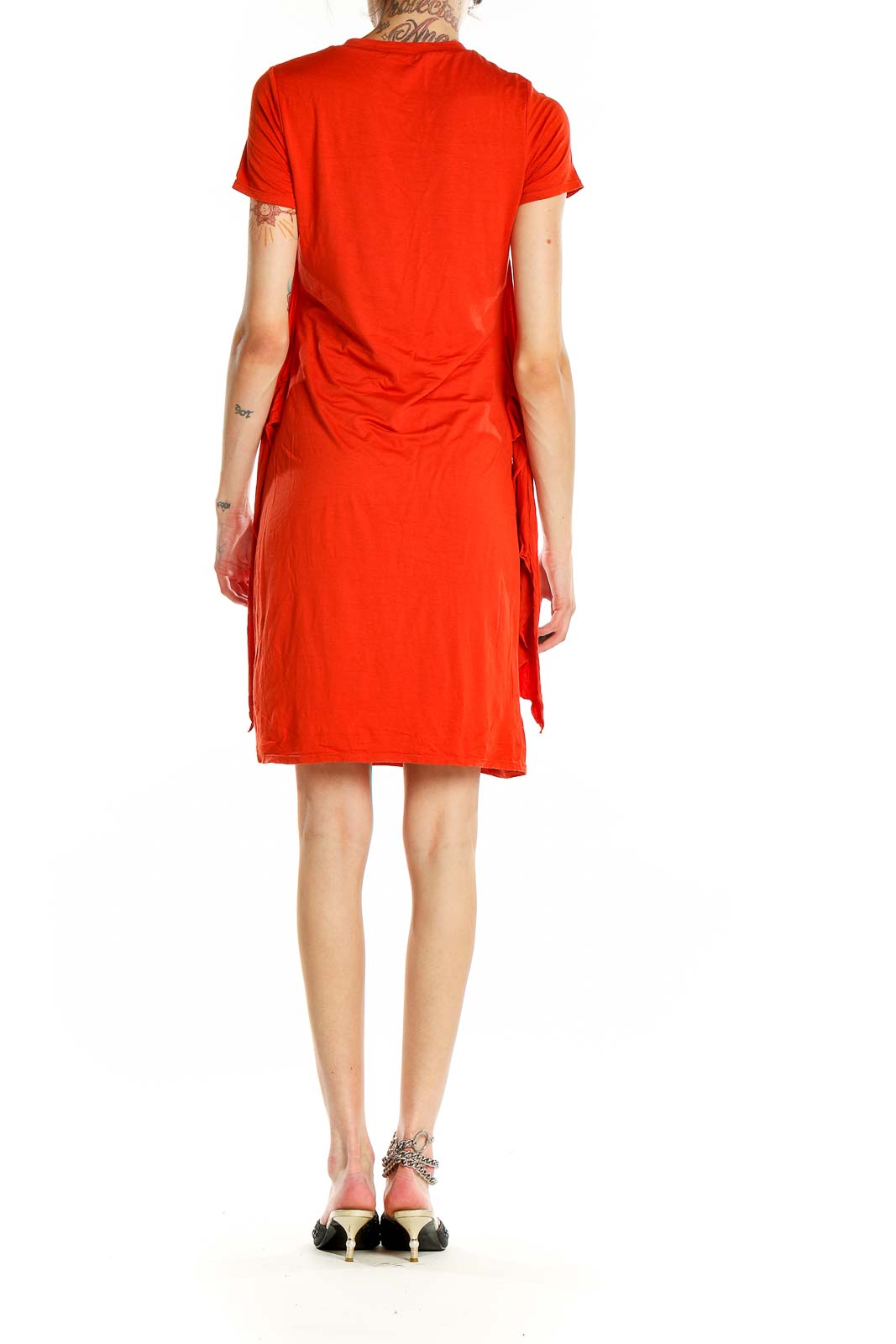Side view of red Three Dots t-shirt dress showing side tie detail