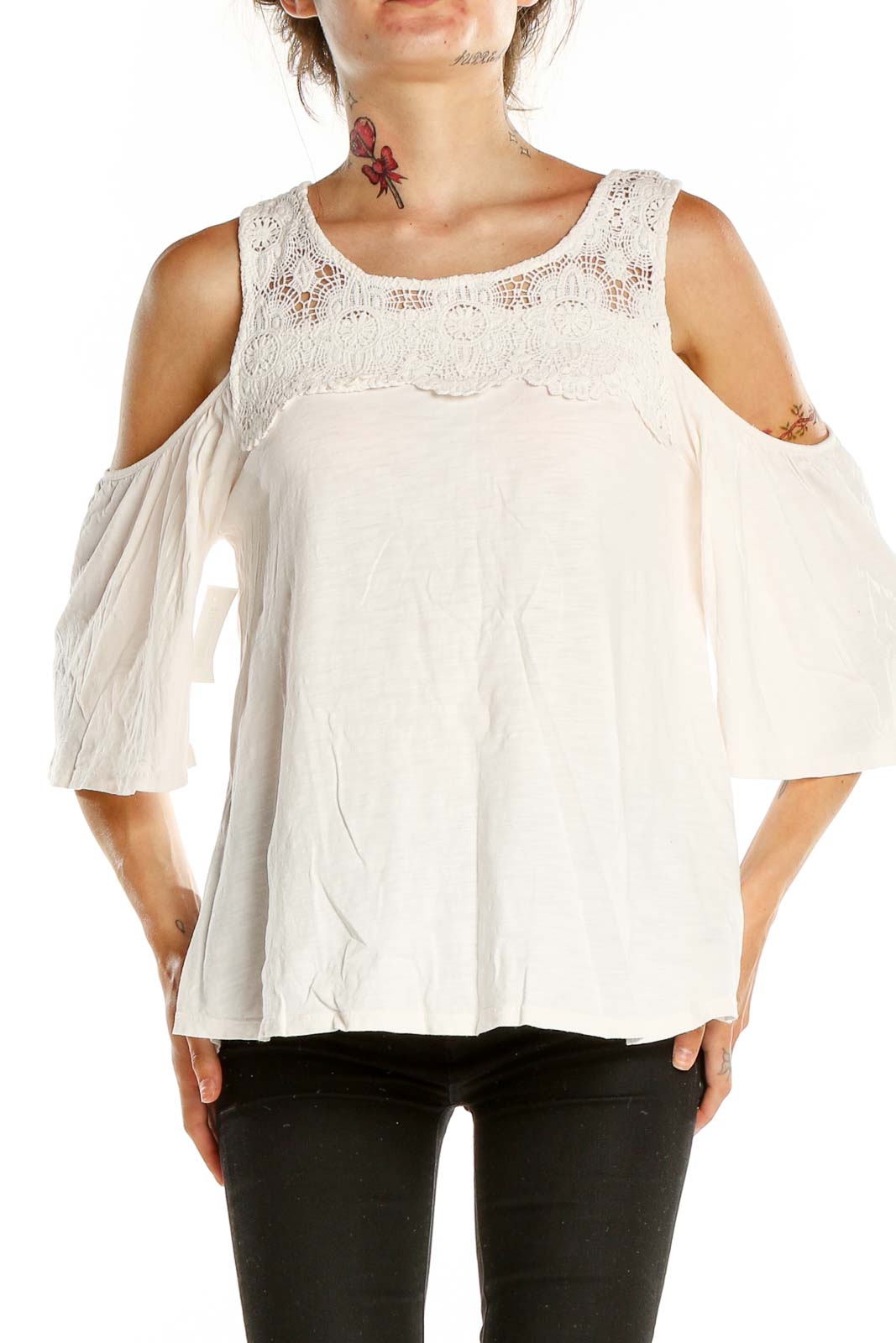 Front view of Sanctuary white lace cold shoulder blouse with fluttery sleeves