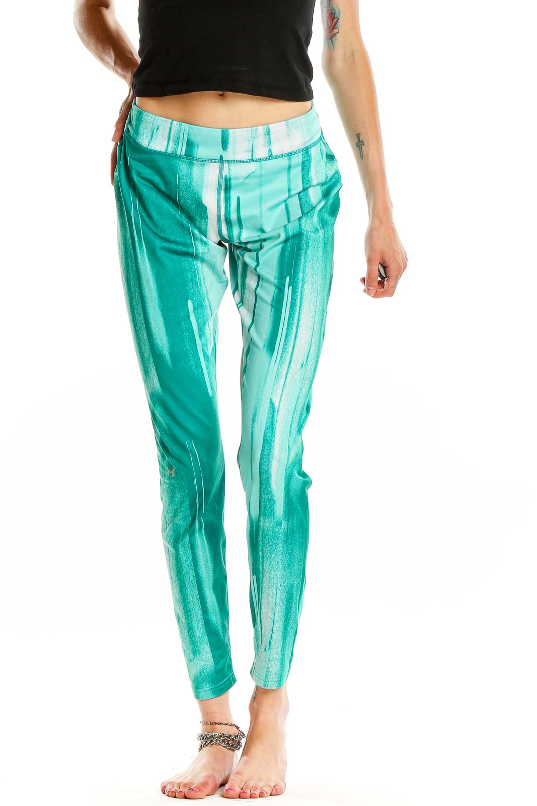 Front view of teal tie-dye Under Armour athletic leggings